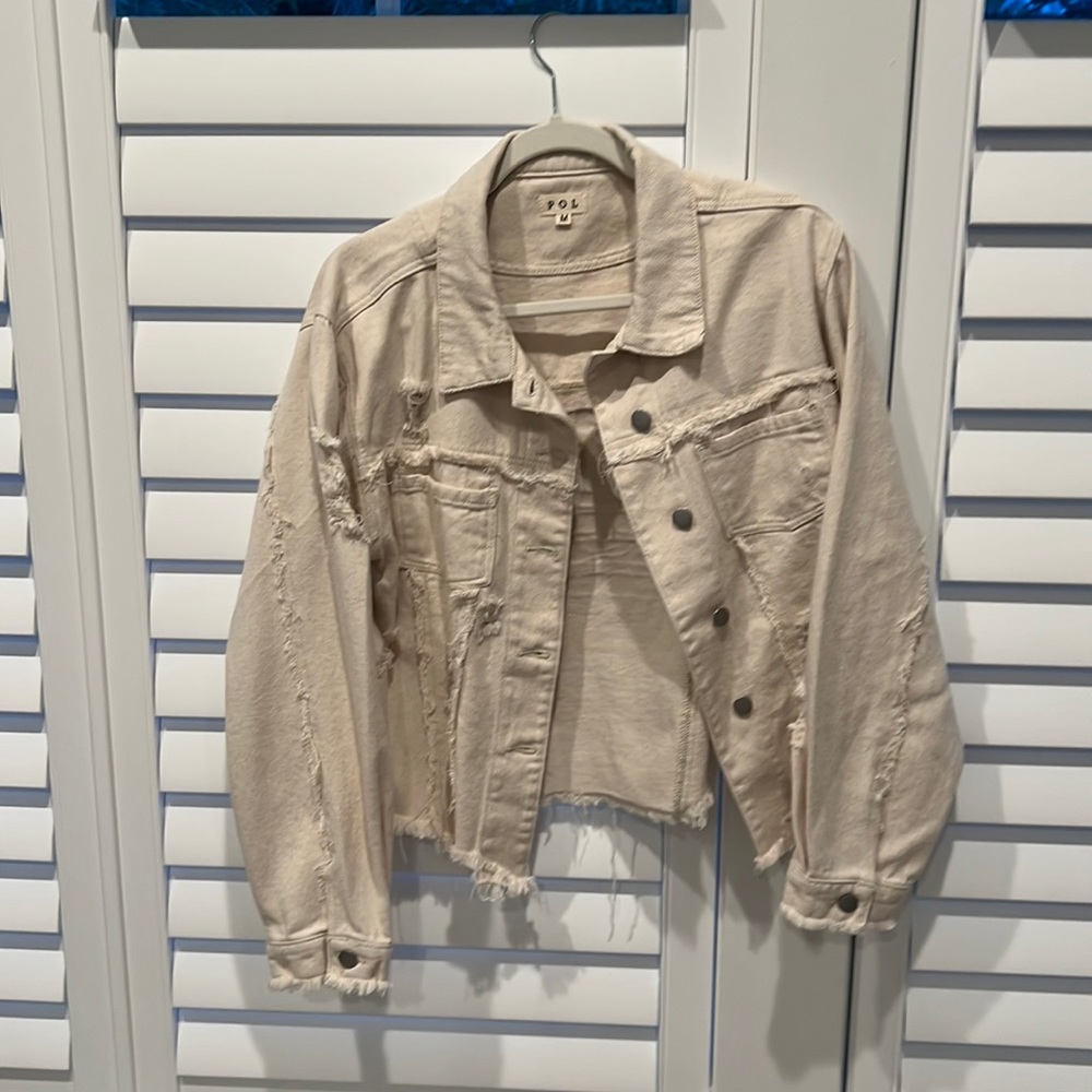 Tan jean jacket with American flag